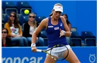 BIRMINGHAM, ENGLAND - JUNE 11: Johanna Konta of the United Kingdom in action against Aleksandra Wozniak of Canada during day three of the Aegon Classic at the Edgbaston Priory Club on June 11, 2014 in Birmingham, England. (Photo by Paul Thomas/Getty Images)